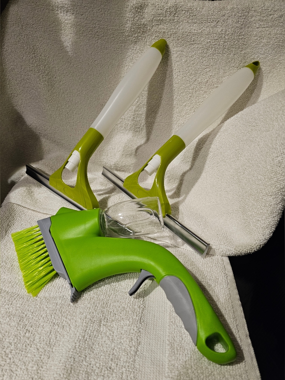 Two Squeegies And 1 Track Cleaner.  All Handles Hold Cleaning Product.  All New